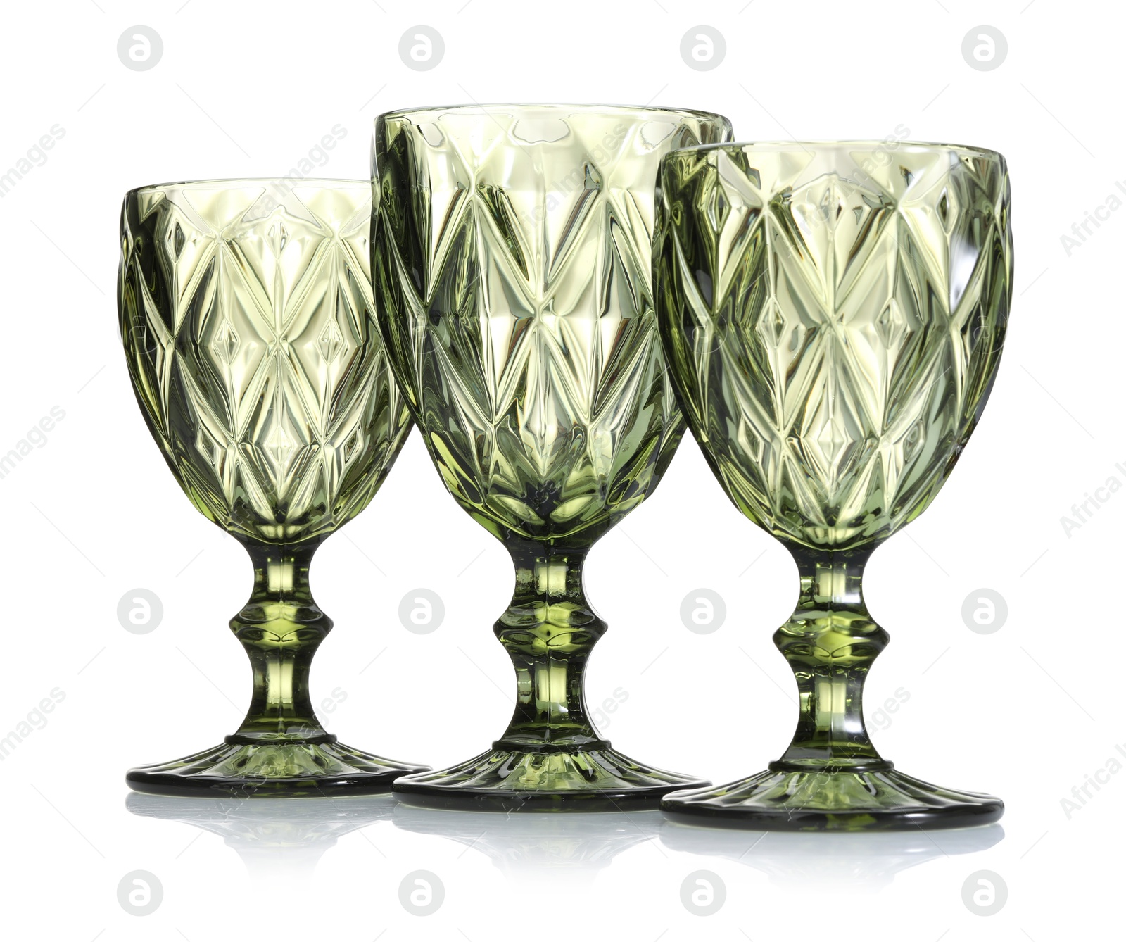 Three empty clean glasses isolated on white Photo of Three empty clean glasses isolated on white
