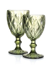 Photo of Two empty clean glasses isolated on white