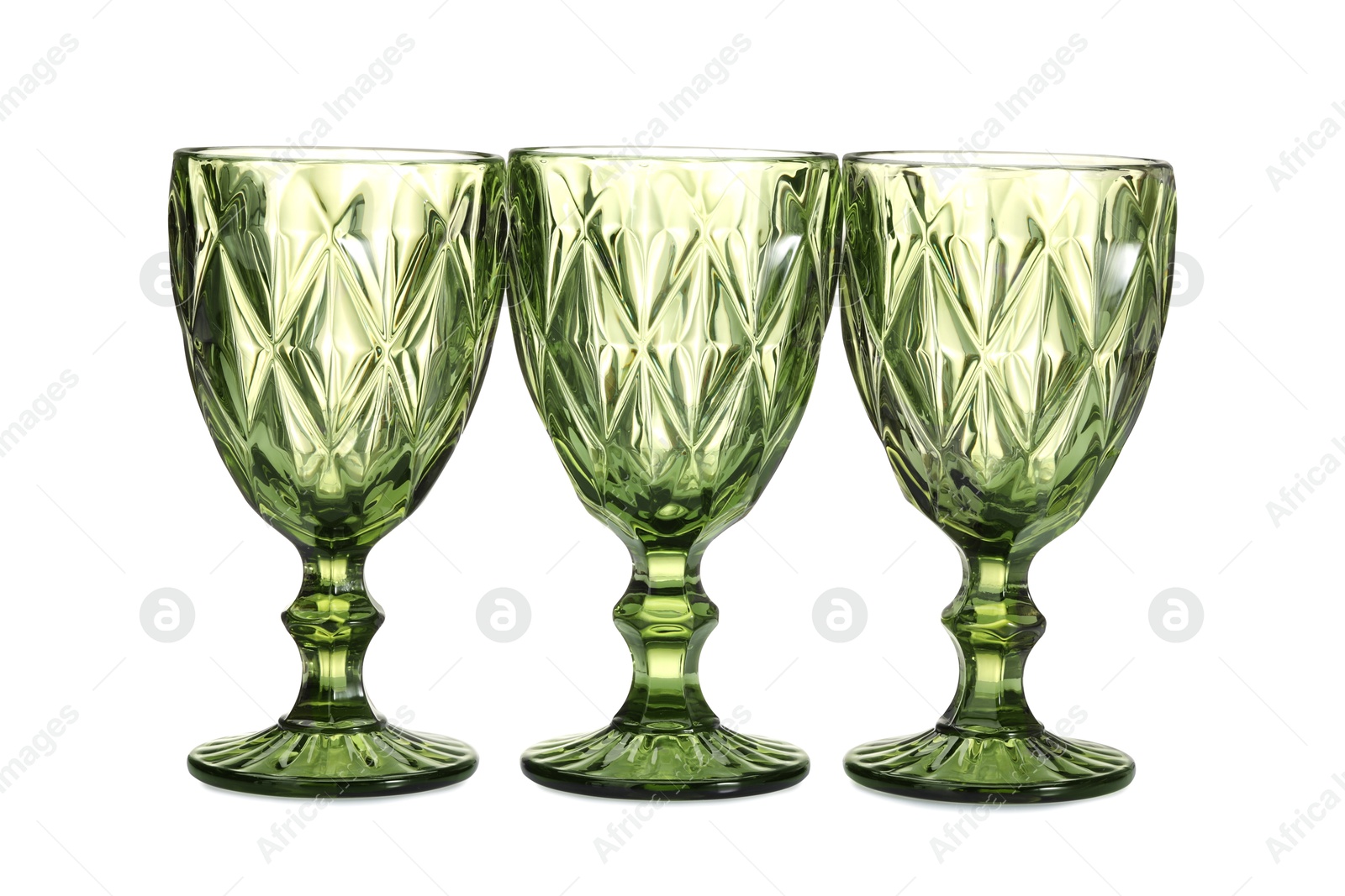 Three empty clean glasses isolated on white Photo of Three empty clean glasses isolated on white