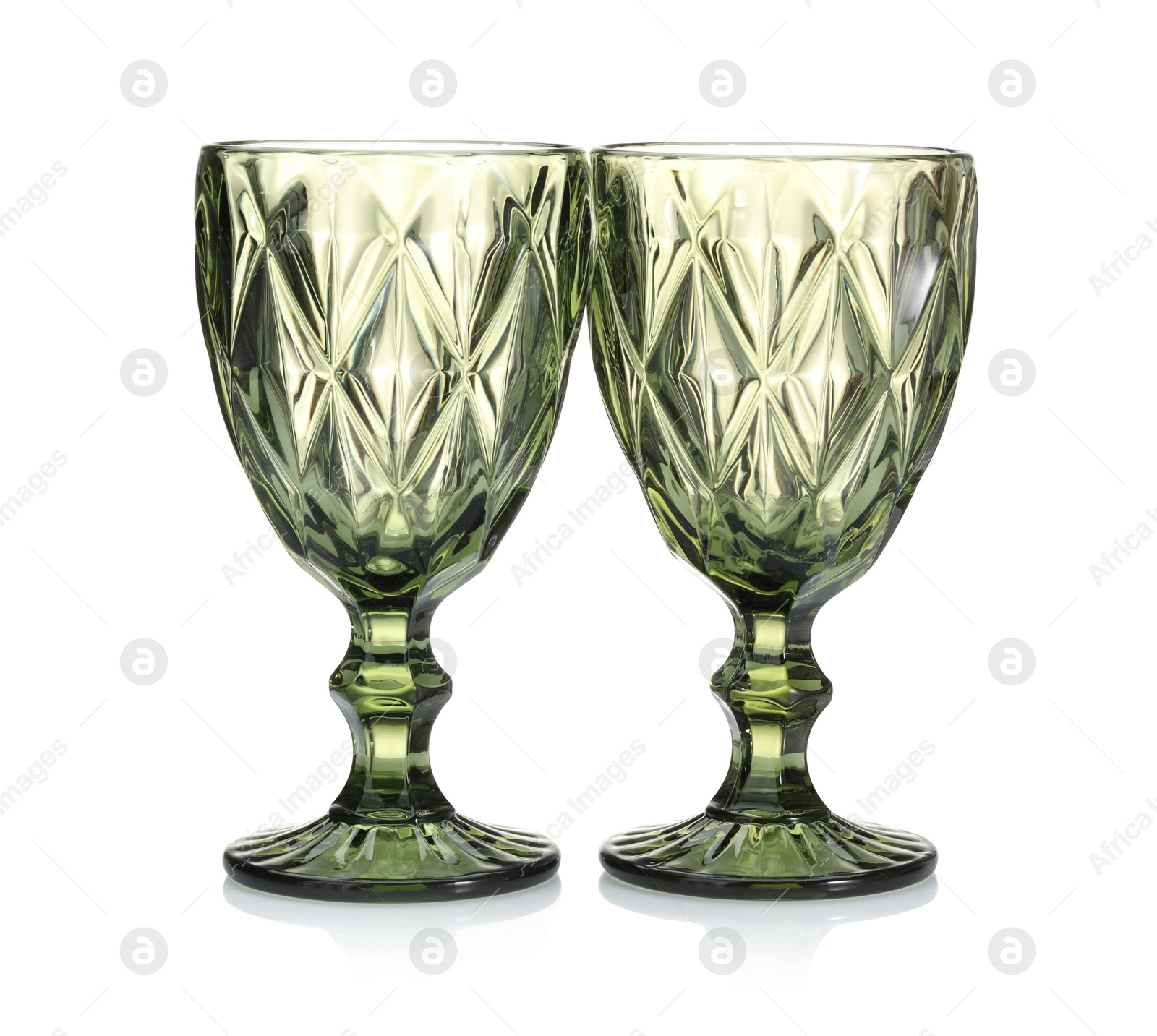 Two empty clean glasses isolated on white Photo of Two empty clean glasses isolated on white
