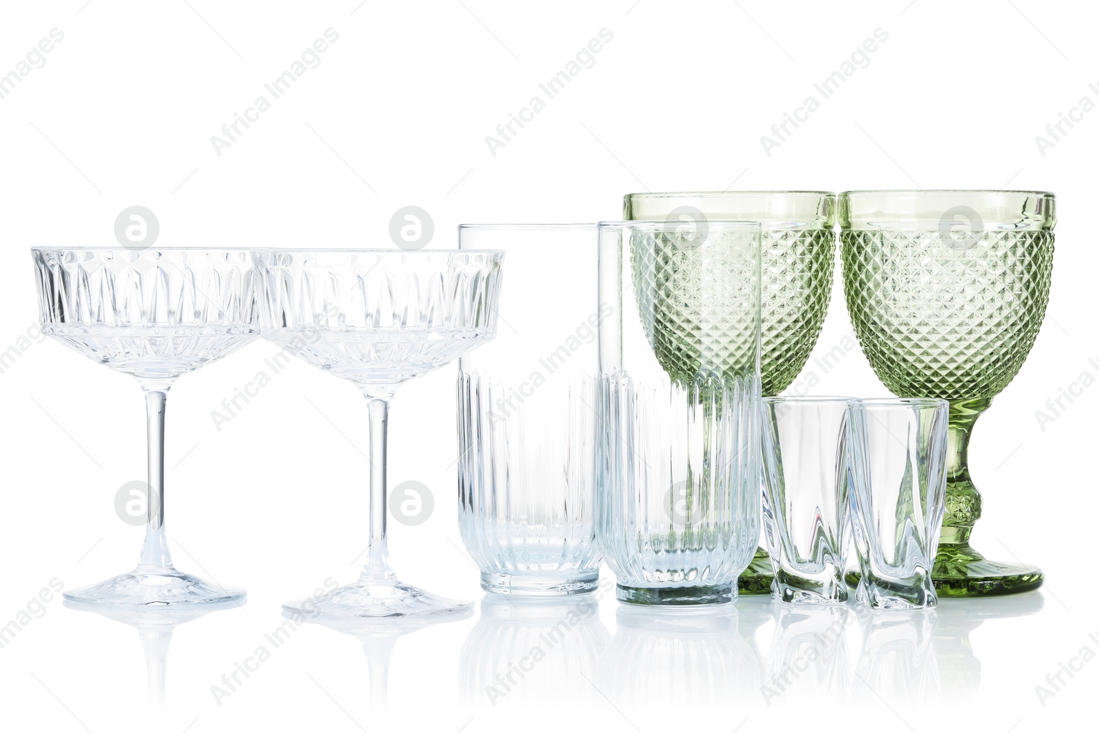 Different empty clean glasses isolated on white Photo of Different empty clean glasses isolated on white