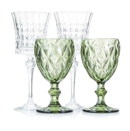 Photo of Different empty clean glasses isolated on white