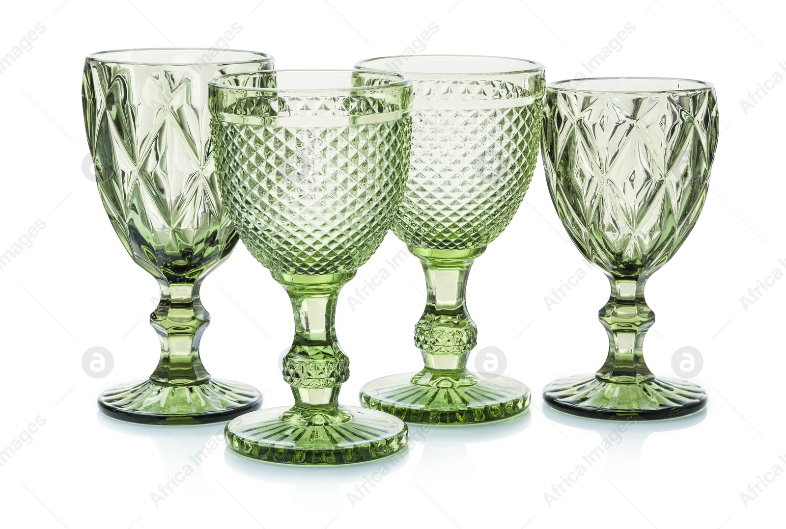 Different empty clean glasses isolated on white Photo of Different empty clean glasses isolated on white