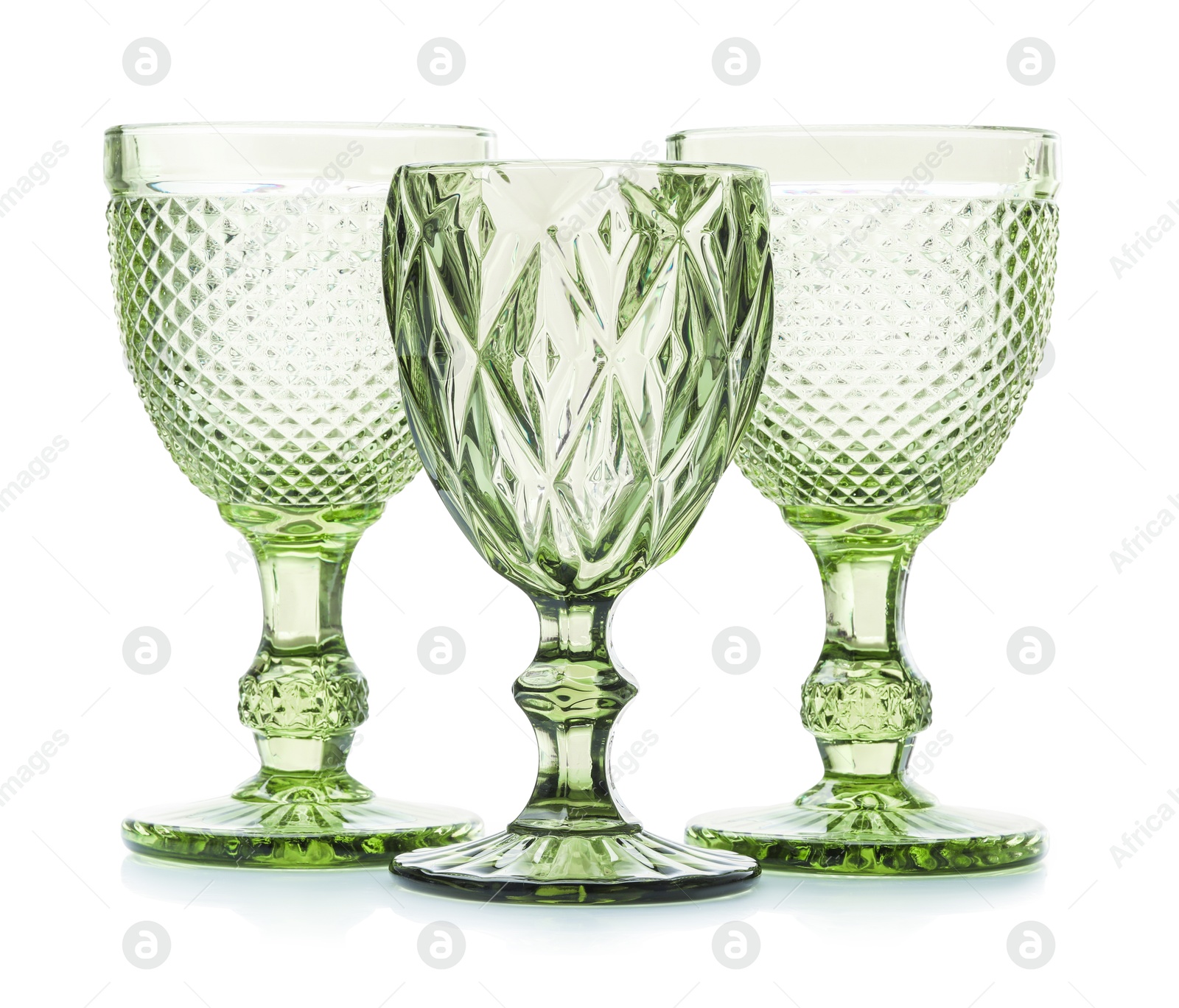 Three empty clean glasses isolated on white Photo of Three empty clean glasses isolated on white