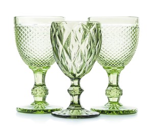 Photo of Three empty clean glasses isolated on white