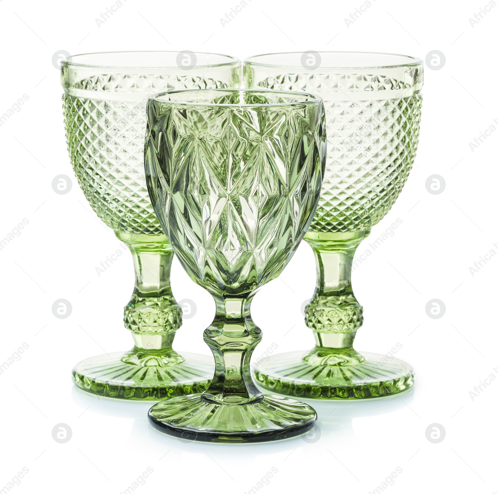 Three empty clean glasses isolated on white Photo of Three empty clean glasses isolated on white