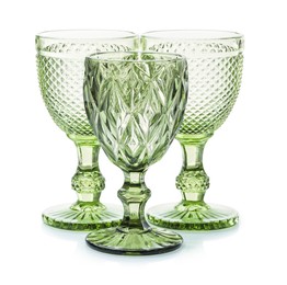 Photo of Three empty clean glasses isolated on white