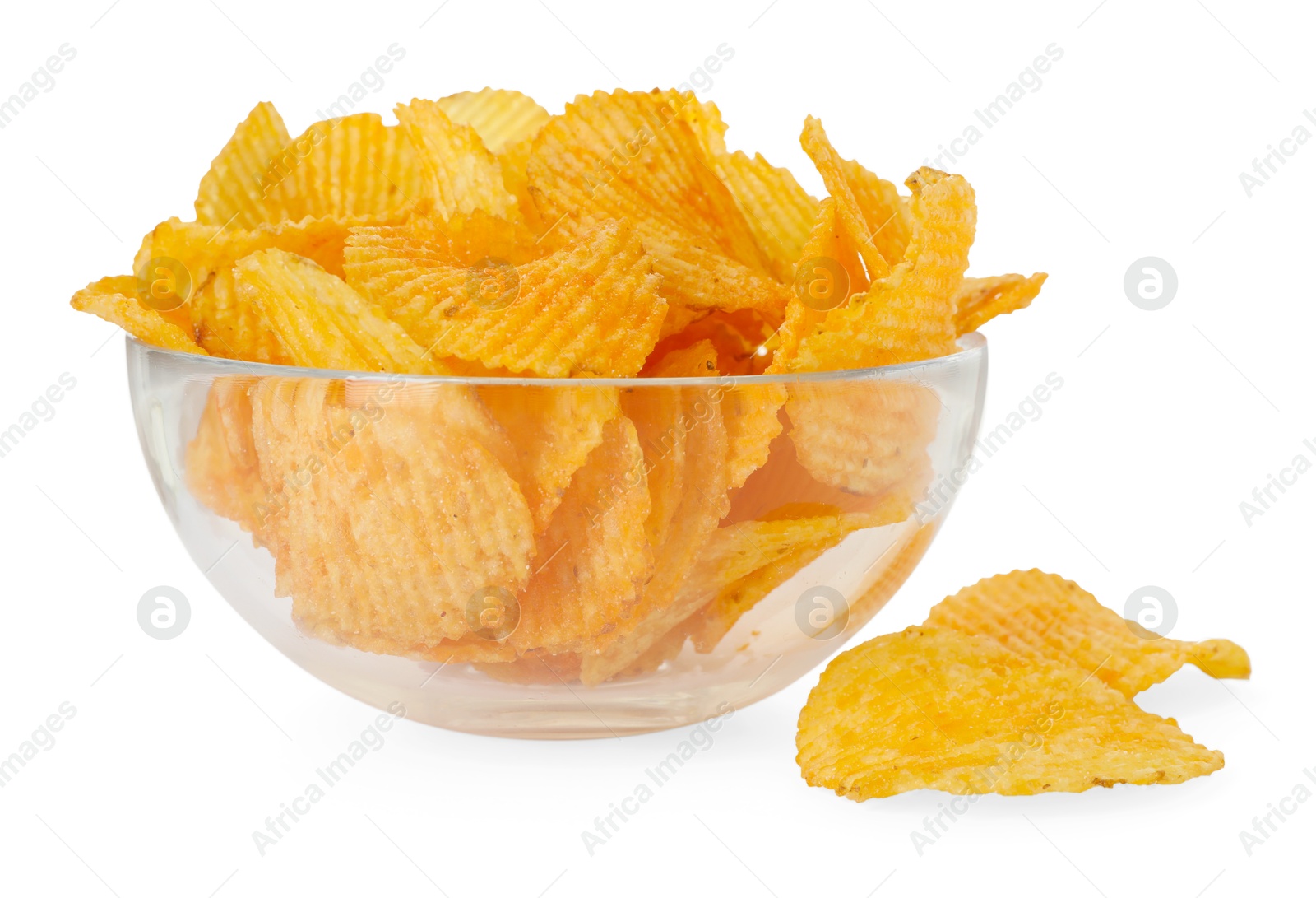 Tasty ridged chips in bowl isolated on white Photo of Tasty ridged chips in bowl isolated on white