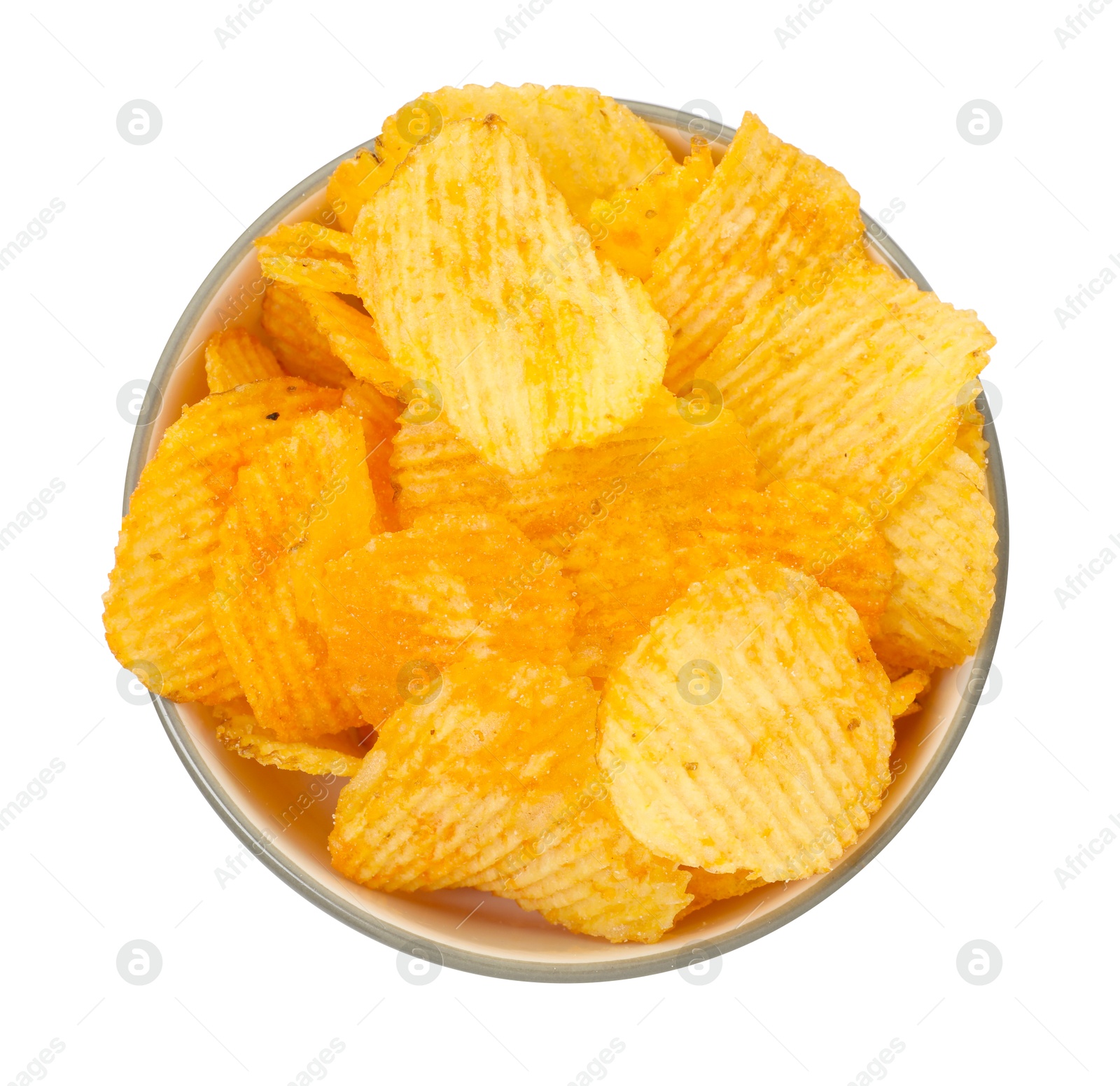 Tasty ridged chips in bowl isolated on white, top view Photo of Tasty ridged chips in bowl isolated on white, top view