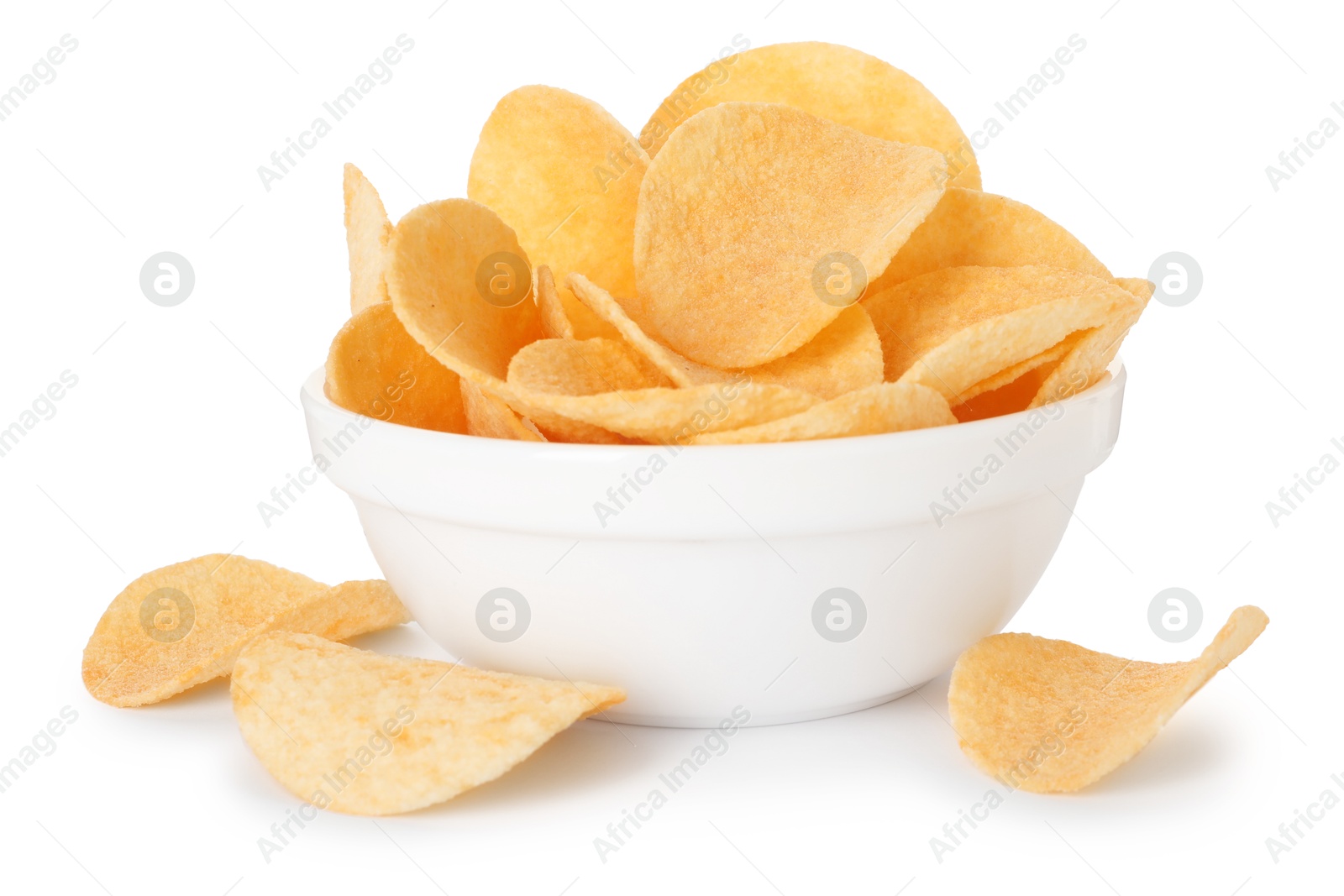 Tasty chips in bowl isolated on white Photo of Tasty chips in bowl isolated on white