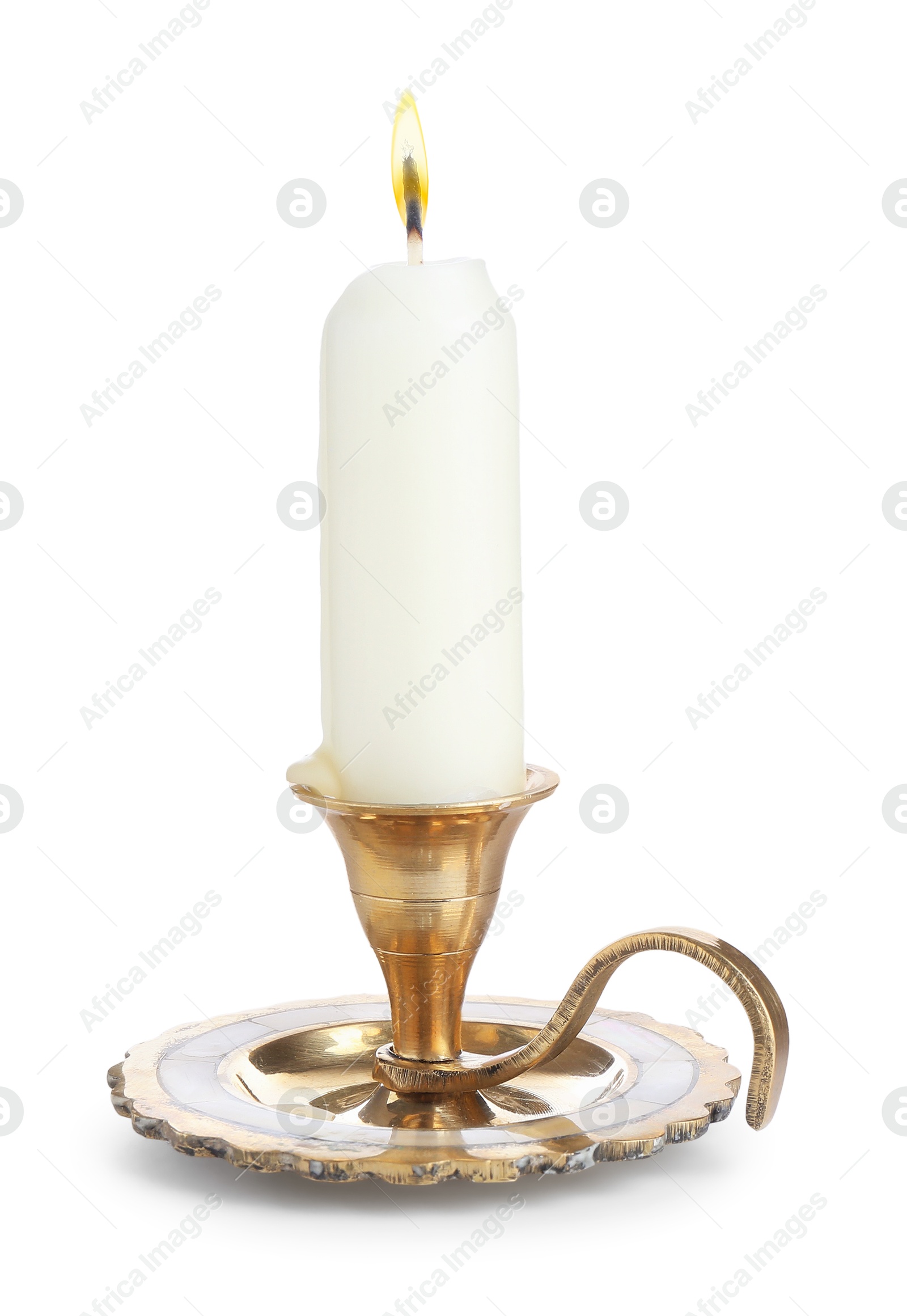 Burning candle in candlestick isolated on white Photo of Burning candle in candlestick isolated on white