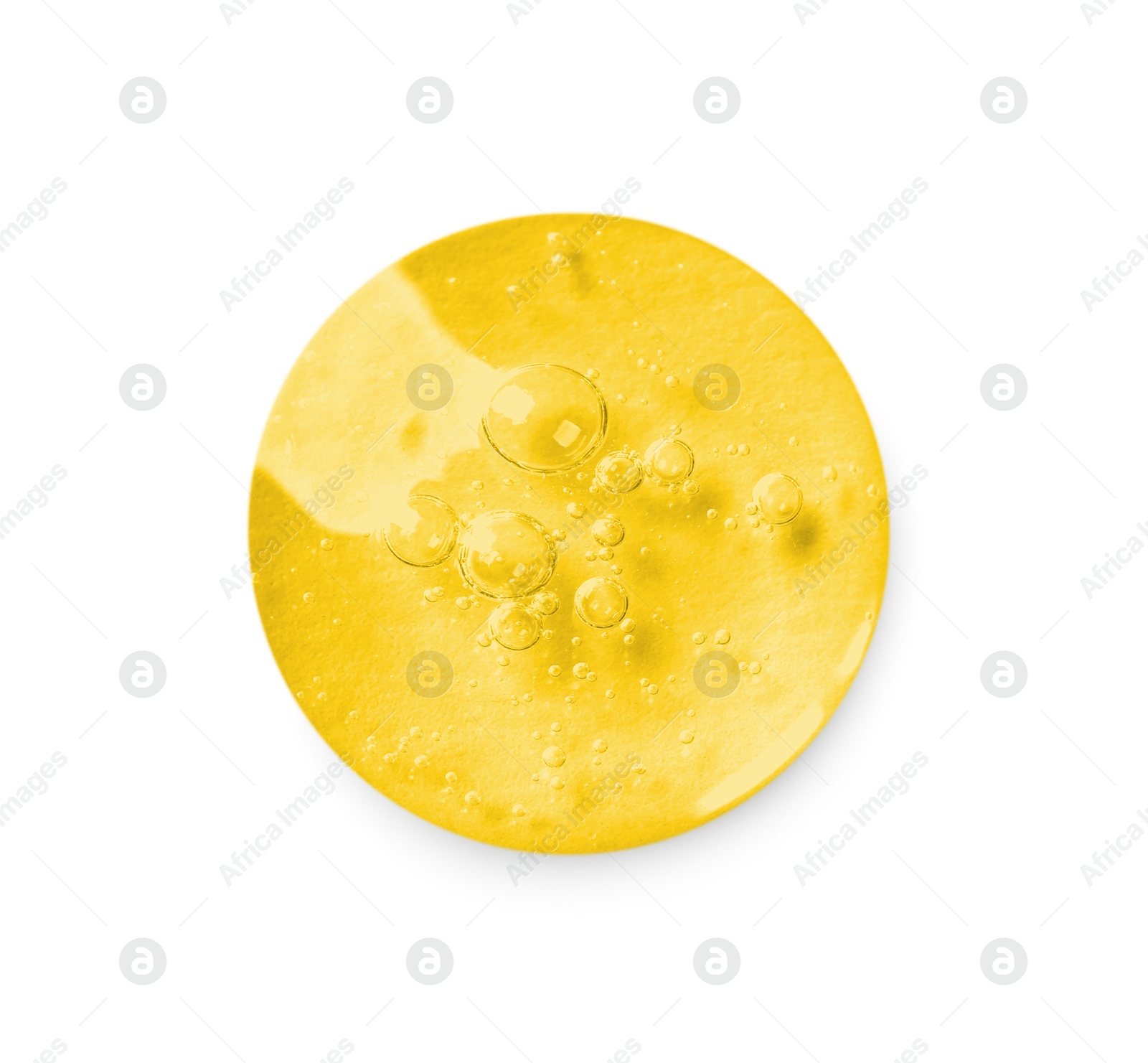 Drop of golden serum on white background Image of Drop of golden serum on white background