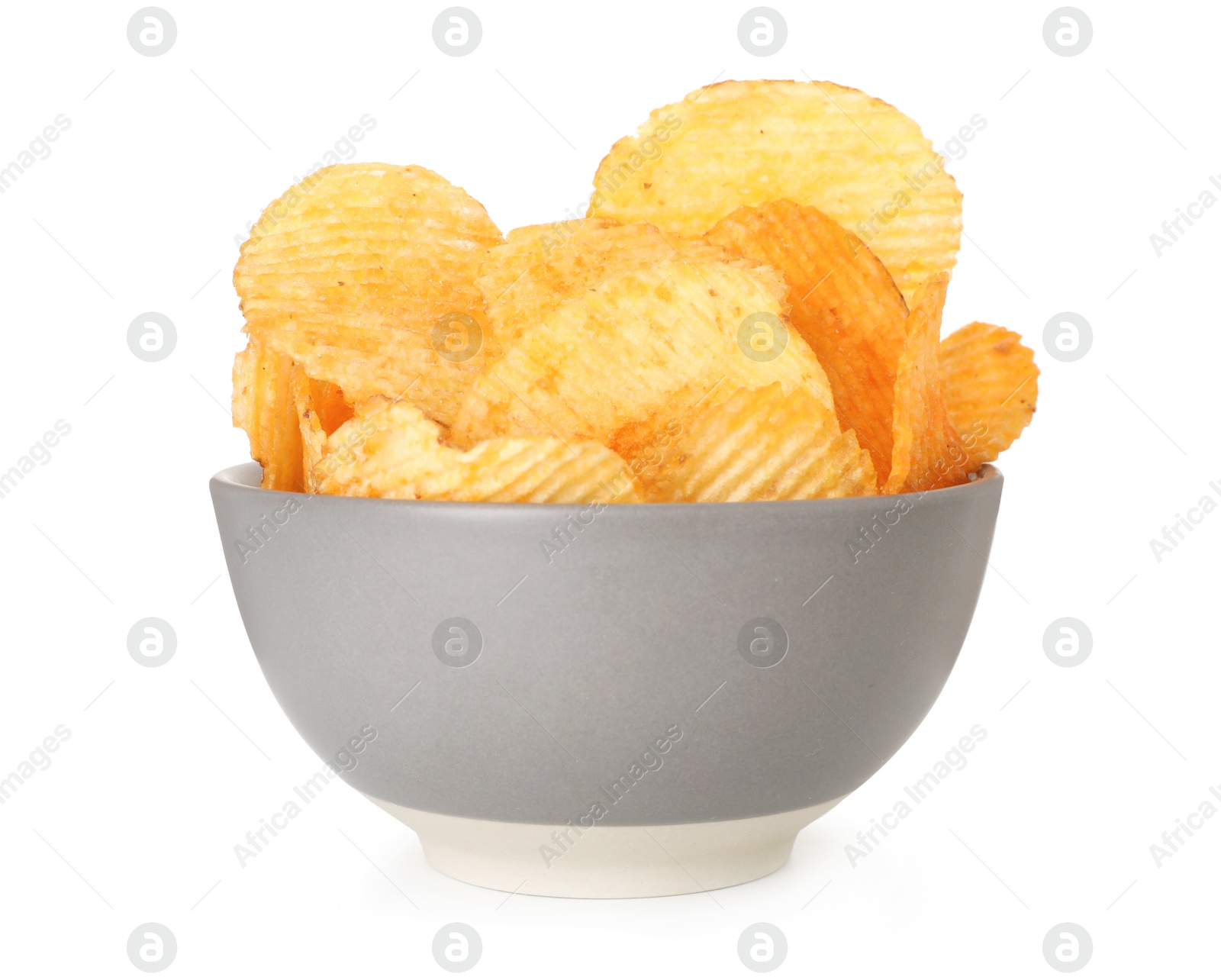 Tasty potato chips in bowl isolated on white Photo of Tasty potato chips in bowl isolated on white