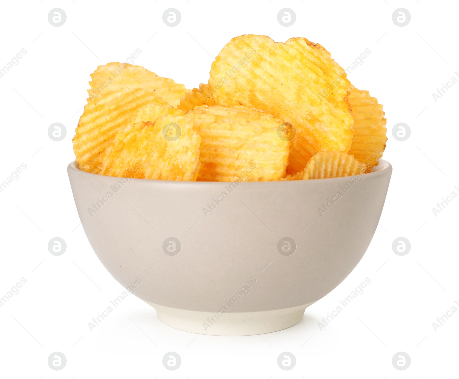 Tasty potato chips in bowl isolated on white Photo of Tasty potato chips in bowl isolated on white