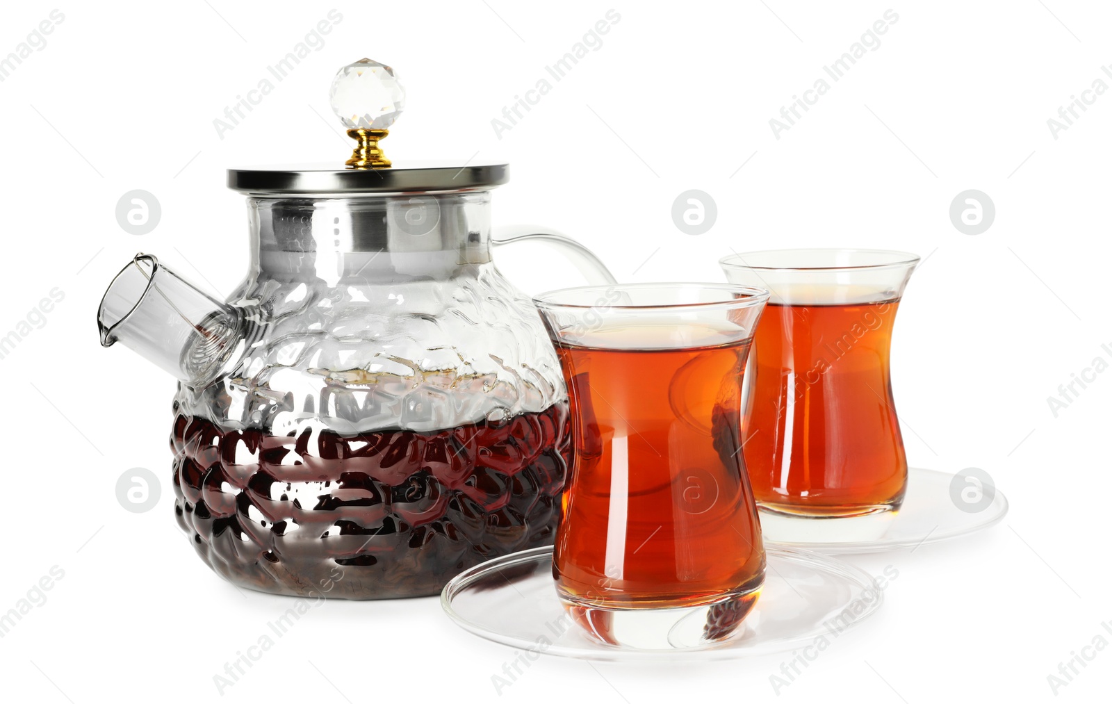 Traditional Turkish tea in glasses and teapot isolated on white Photo of Traditional Turkish tea in glasses and teapot isolated on white