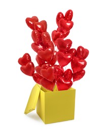 Image of Bright heart-shaped balloons flying out of yellow box on white background