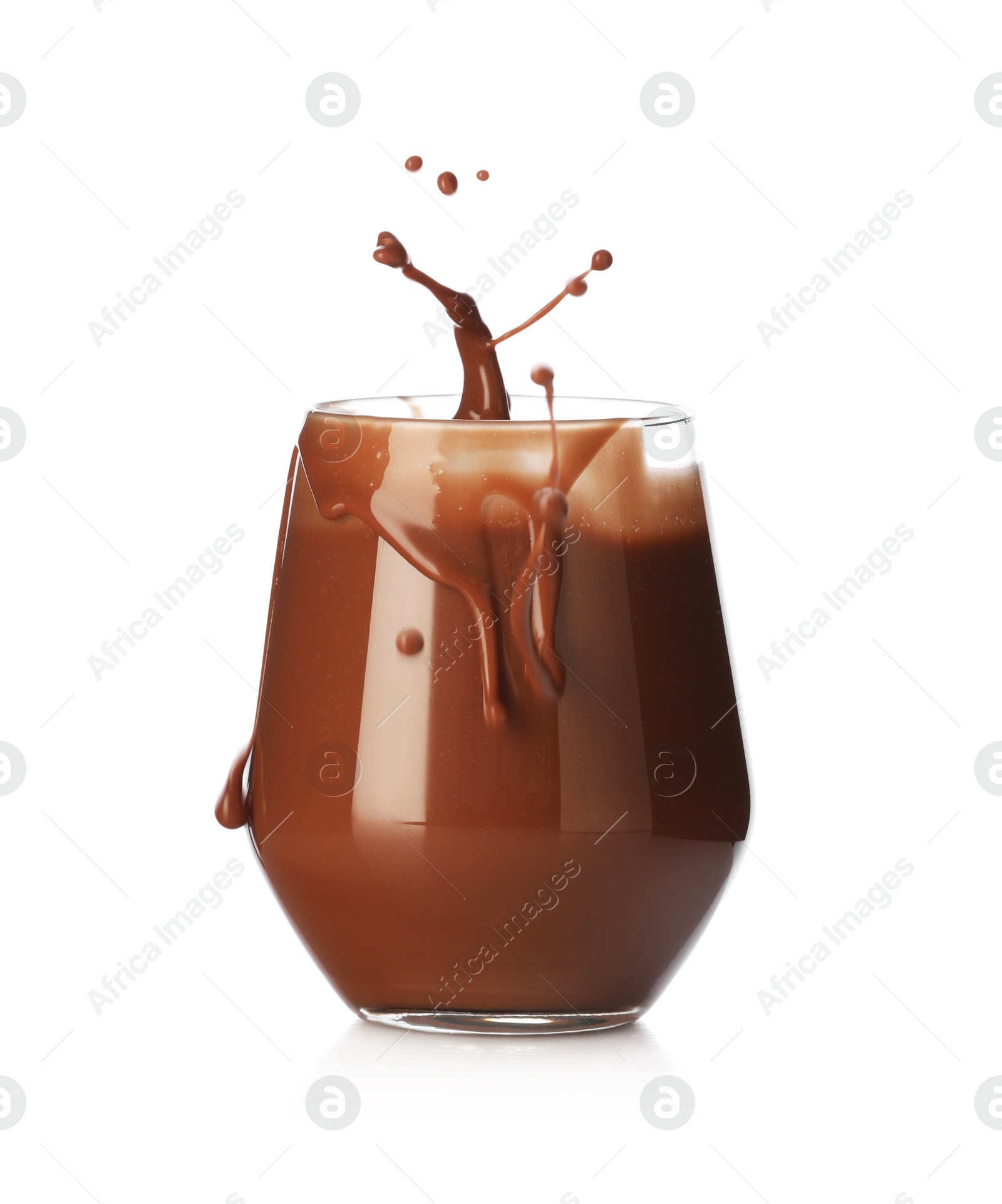 Tasty chocolate milk splashing in glass isolated on white Photo of Tasty chocolate milk splashing in glass isolated on white