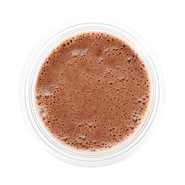 Photo of Tasty chocolate milk in plastic cup isolated on white, top view