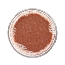 Photo of Tasty chocolate milk in glass isolated on white, top view