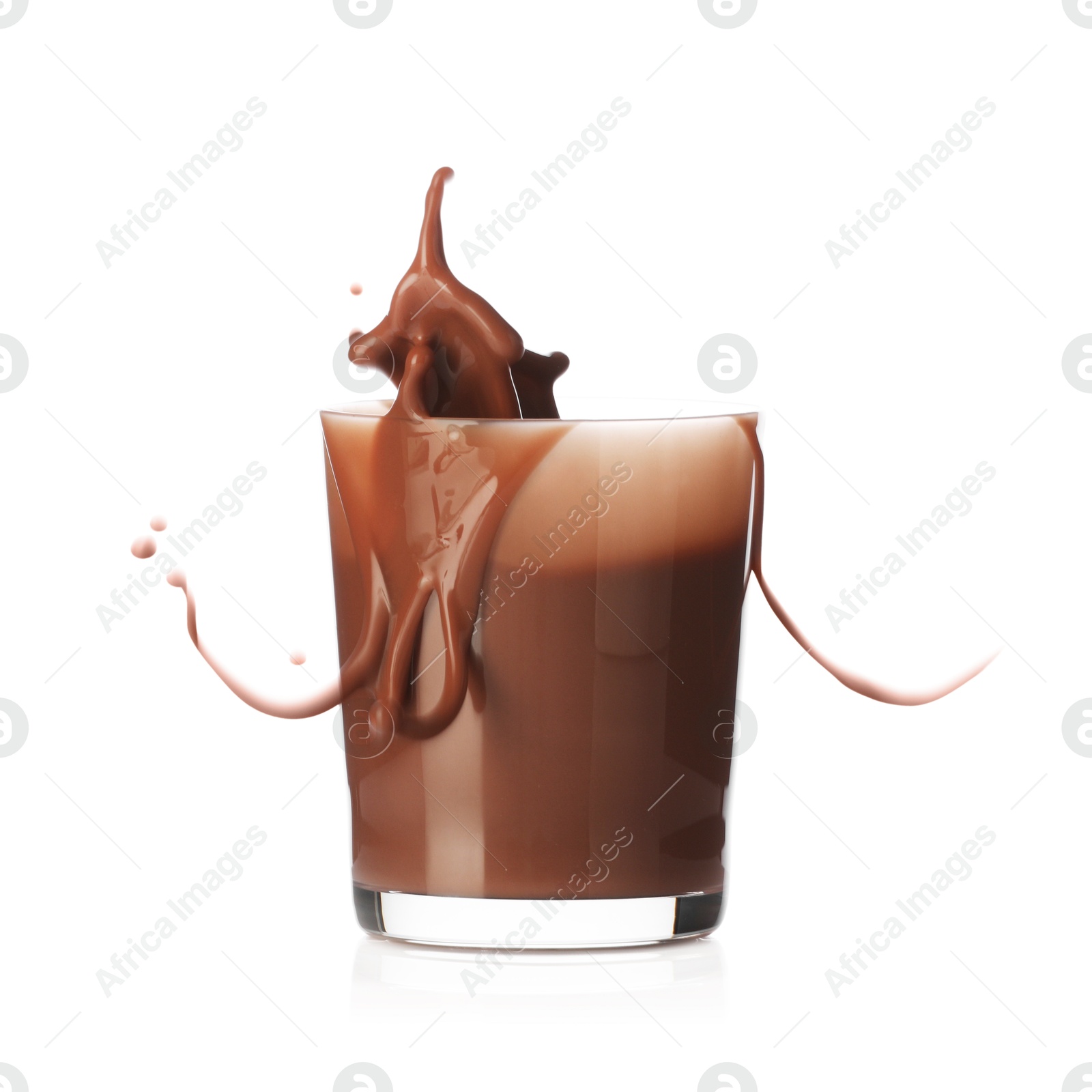 Tasty chocolate milk splashing in glass isolated on white Photo of Tasty chocolate milk splashing in glass isolated on white