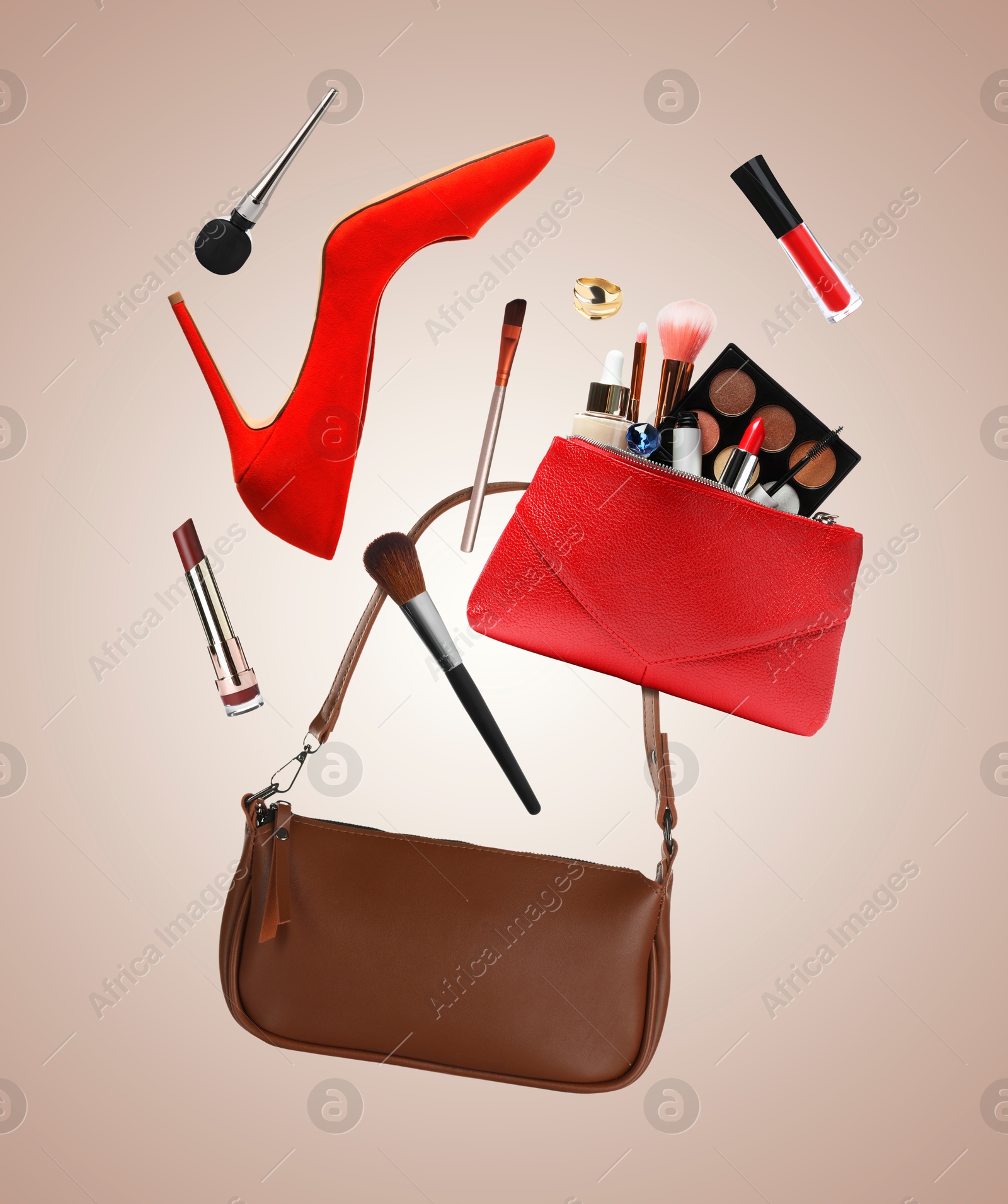 Fashionable shoes, makeup products and accessories in air on dark beige background Image of Fashionable shoes, makeup products and accessories in air on dark beige background