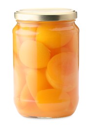 Photo of Tasty canned apricots in jar isolated on white