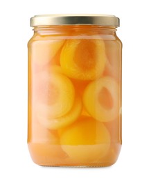Photo of Tasty canned apricots in jar isolated on white