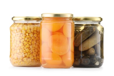 Photo of Many jars with different pickled products isolated on white
