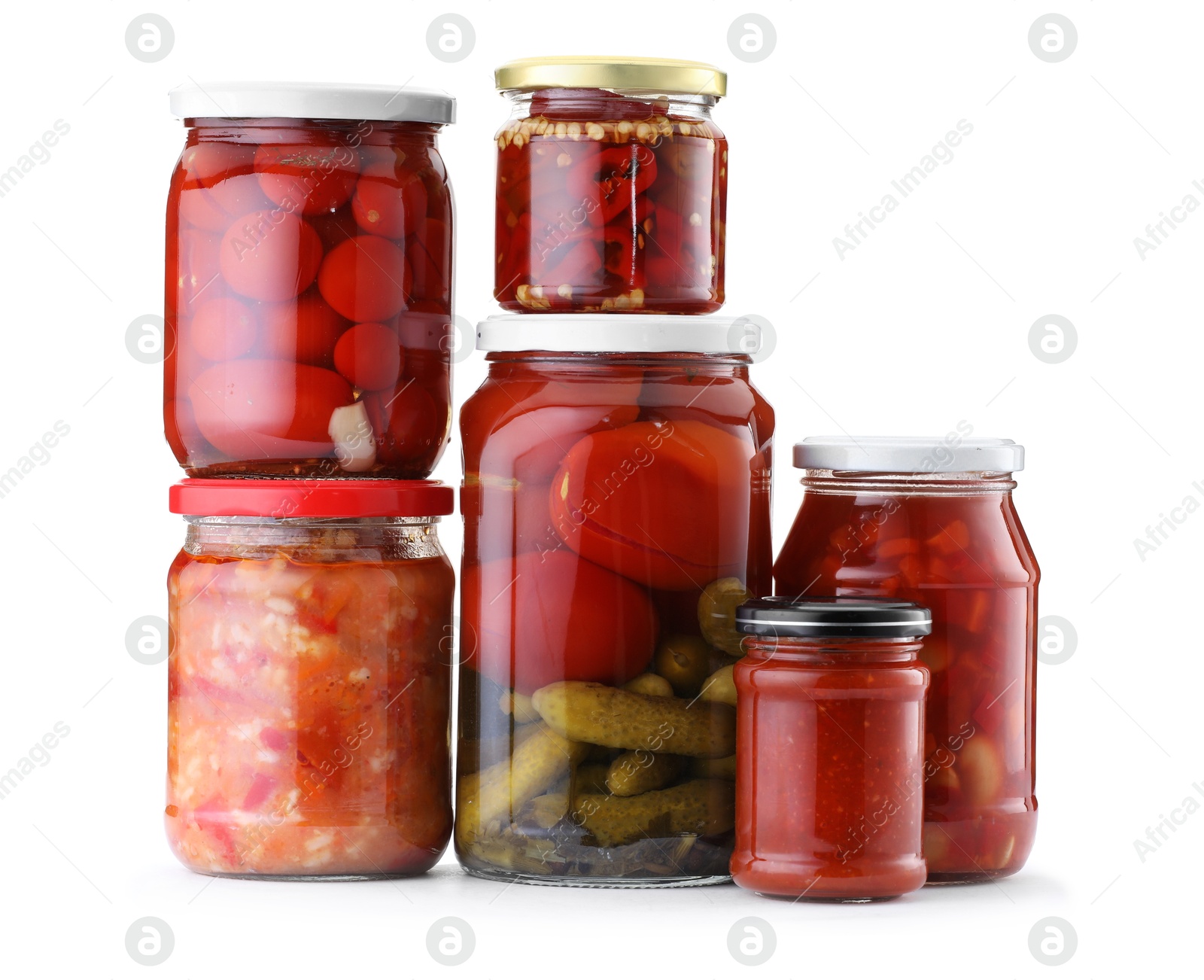Many jars with different pickled products isolated on white Photo of Many jars with different pickled products isolated on white