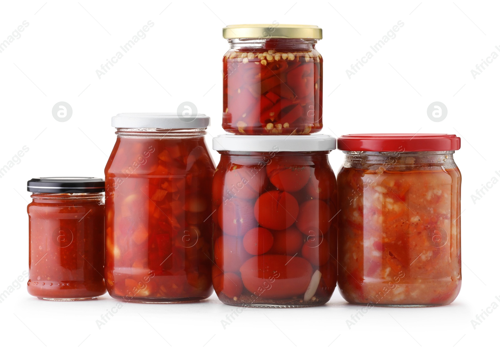 Many jars with different pickled products isolated on white Photo of Many jars with different pickled products isolated on white