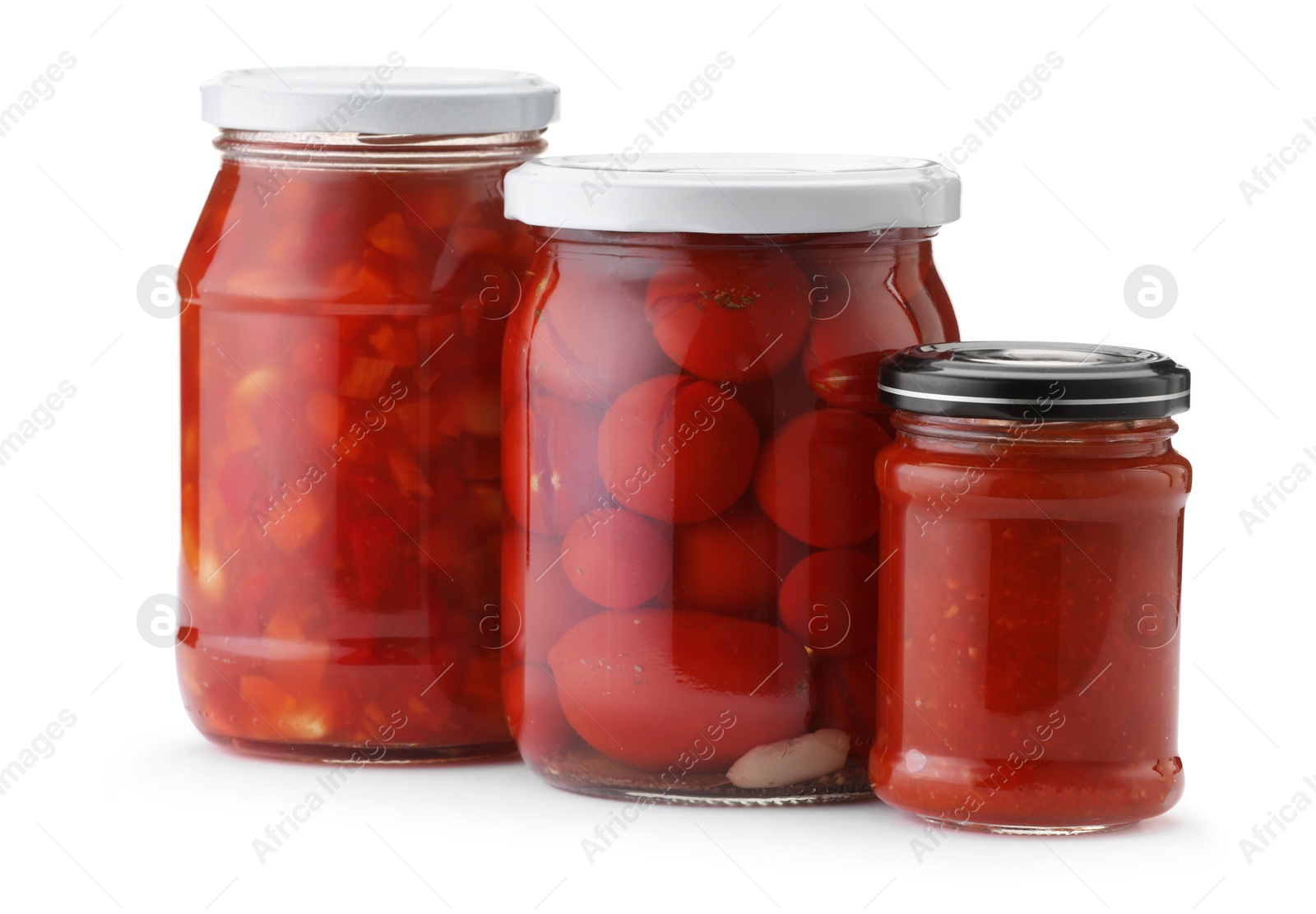 Many jars with different pickled products isolated on white Photo of Many jars with different pickled products isolated on white