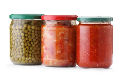 Photo of Many jars with different pickled products isolated on white