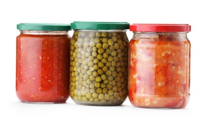 Photo of Many jars with different pickled products isolated on white