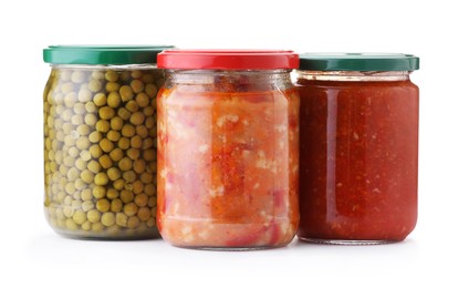 Photo of Many jars with different pickled products isolated on white