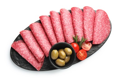 Photo of Slices of delicious sausage with olives and tomatoes isolated on white, top view