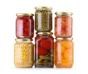 Photo of Many jars with different pickled products isolated on white
