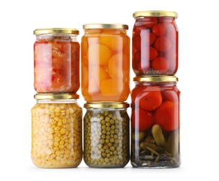 Photo of Many jars with different pickled products isolated on white