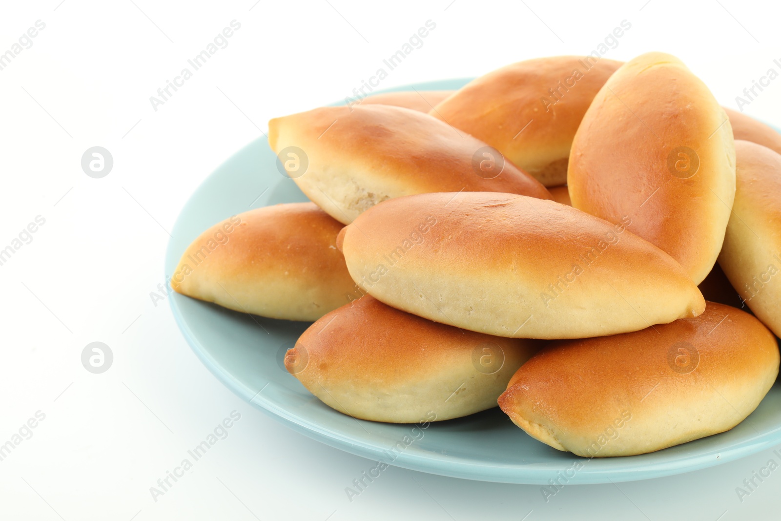 Many tasty baked patties isolated on white Photo of Many tasty baked patties isolated on white