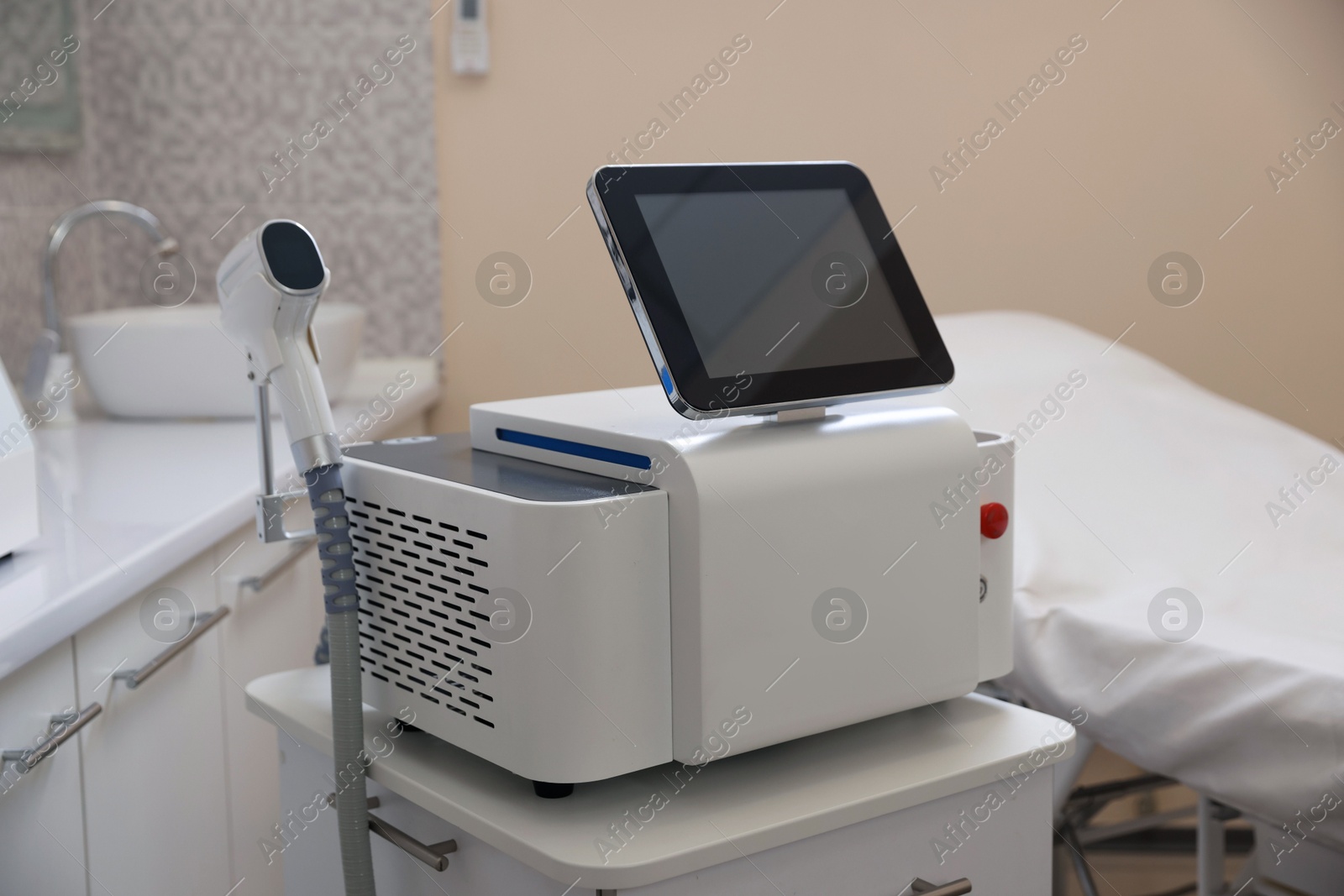Laser hair removal machine in beauty salon Photo of Laser hair removal machine in beauty salon