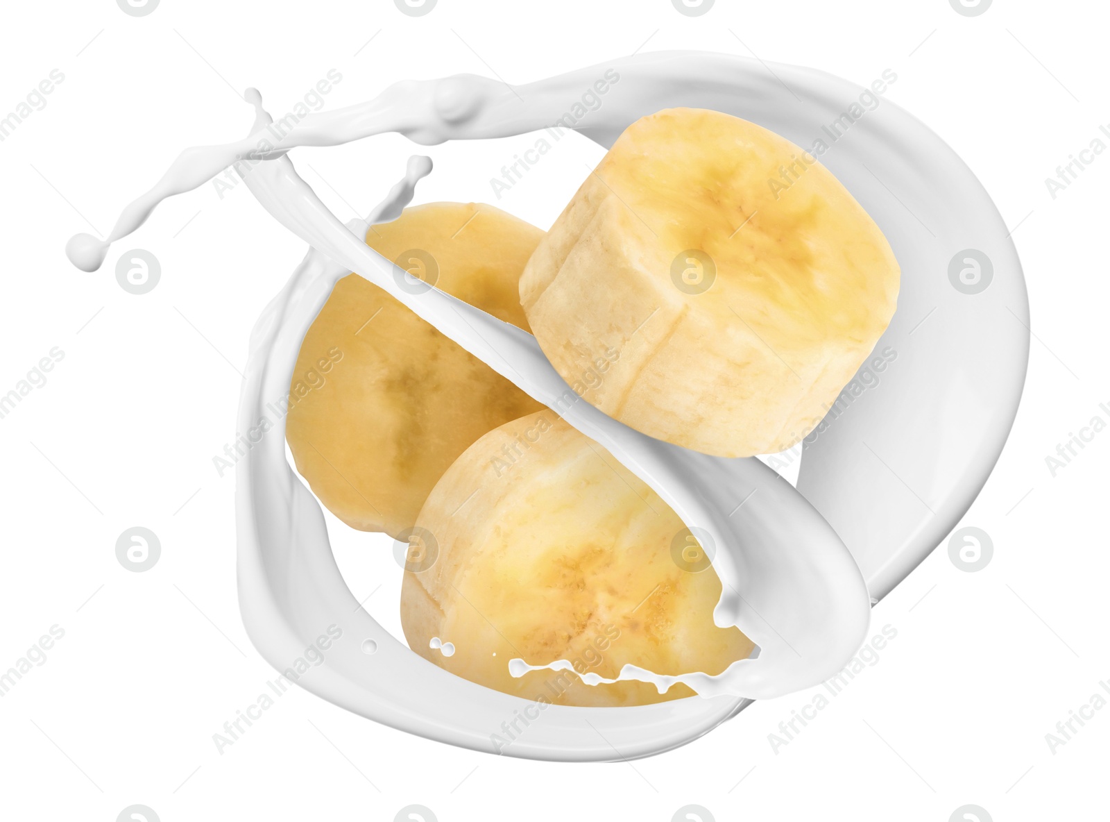 Splash of milk with banana pieces in air on white background Image of Splash of milk with banana pieces in air on white background