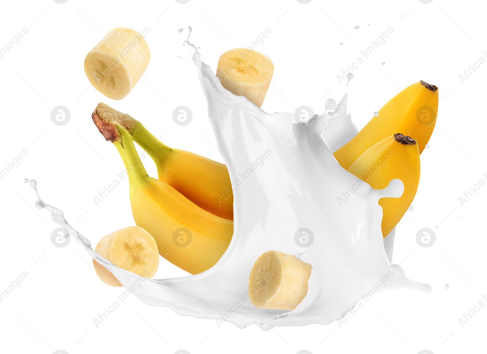 Splash of milk with bananas and pieces in air on white background Image of Splash of milk with bananas and pieces in air on white background