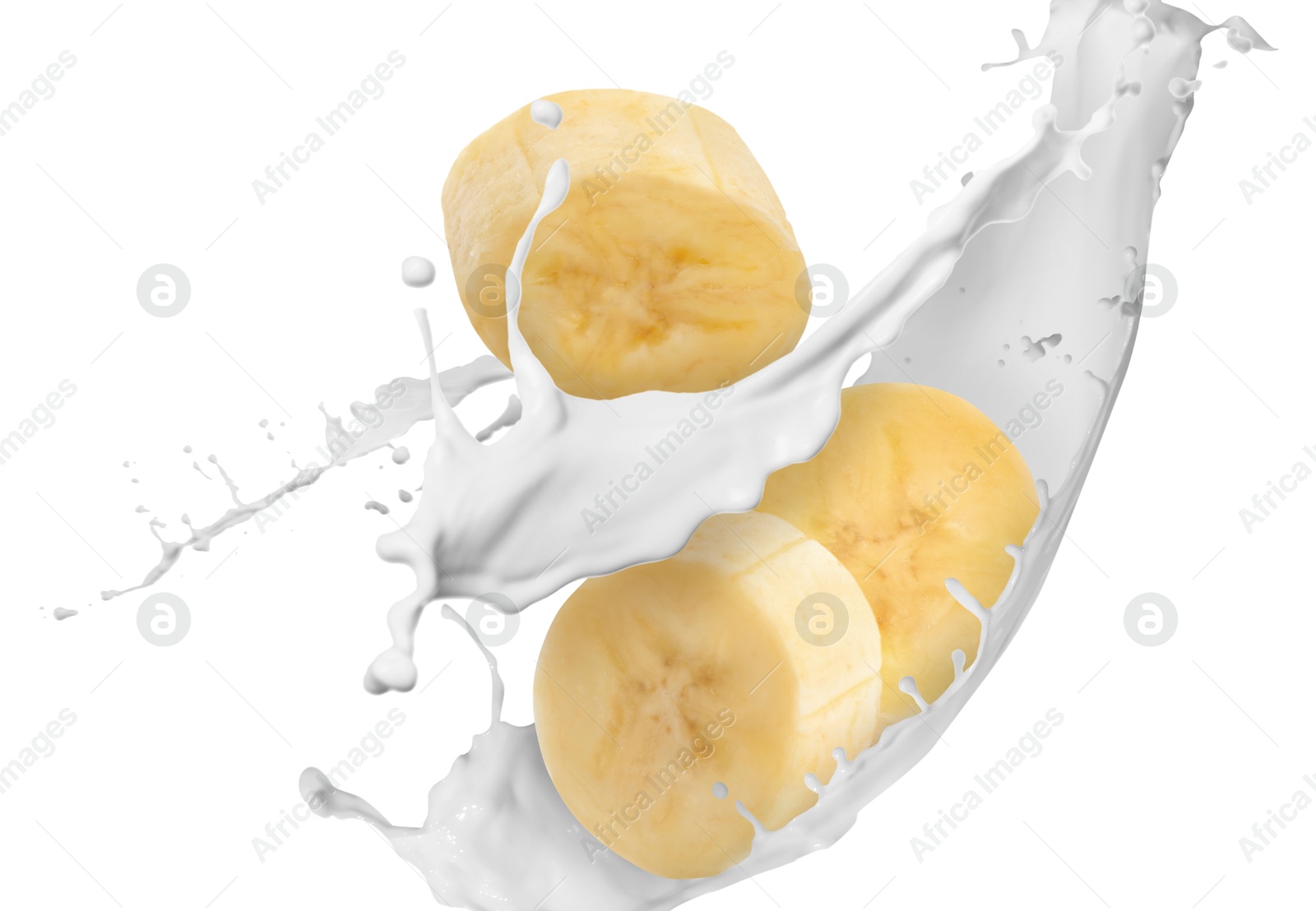 Splash of milk with banana pieces in air on white background Image of Splash of milk with banana pieces in air on white background