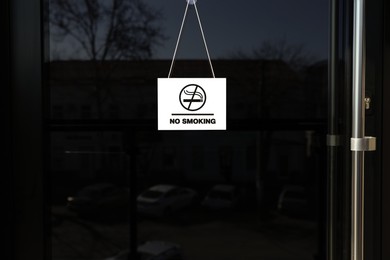 Image of No Smoking sign hanging on entrance door