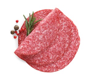 Photo of Slices of tasty smoked sausage with spices isolated on white, top view