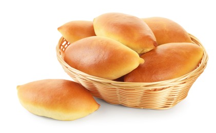 Photo of Tasty baked patties in basket isolated on white