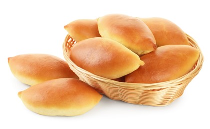 Photo of Tasty baked patties in basket isolated on white