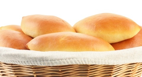 Photo of Tasty baked patties in basket isolated on white