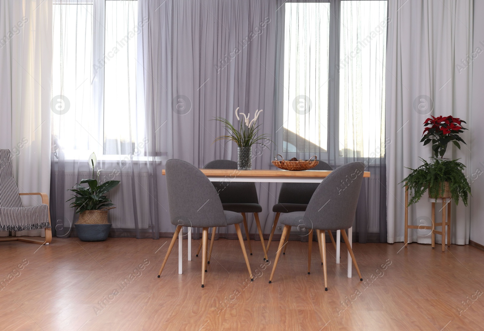 Windows with stylish curtains in living room interior Photo of Windows with stylish curtains in living room interior