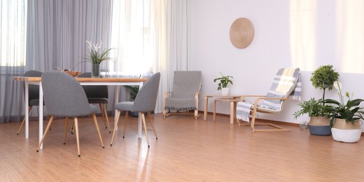 Photo of Windows with stylish curtains in living room interior