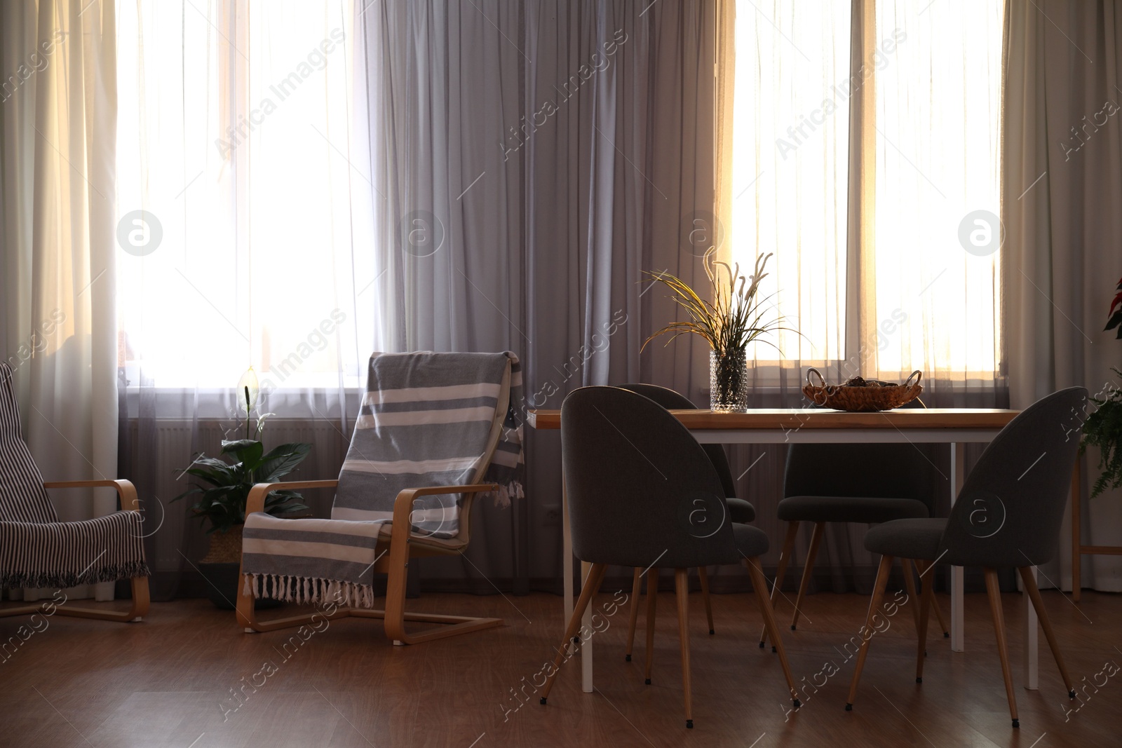 Windows with stylish curtains in living room interior Photo of Windows with stylish curtains in living room interior